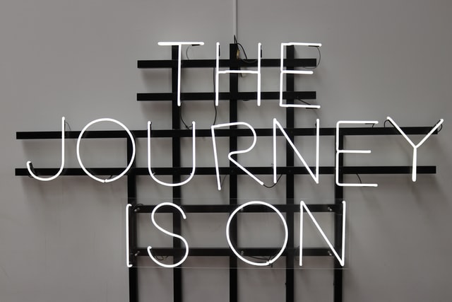 Decorative: Text saying "the journey is on"